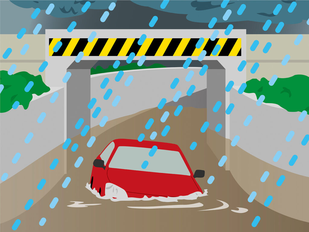 豪雨のアンダーパスで水没したクルマ